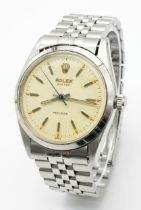 A Very Collectible Vintage (1950s) Rolex Precision Automatic Gents Watch. Stainless steel bracelet