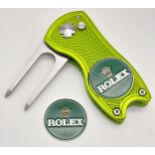 A Rolex Branded Retractable 'Flick' Golf Putting Divot Repair Tool. Removable magnetic ball marker -