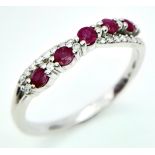 A 9K WHITE GOLD DIAMOND & RUBY RING. Size O 1/2, 2.2g total weight. Ref: SC 8046