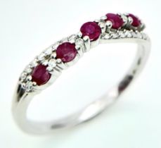 A 9K WHITE GOLD DIAMOND & RUBY RING. Size O 1/2, 2.2g total weight. Ref: SC 8046