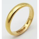 A 22 K yellow gold convex band ring, size: N, weight: 4.5 g.