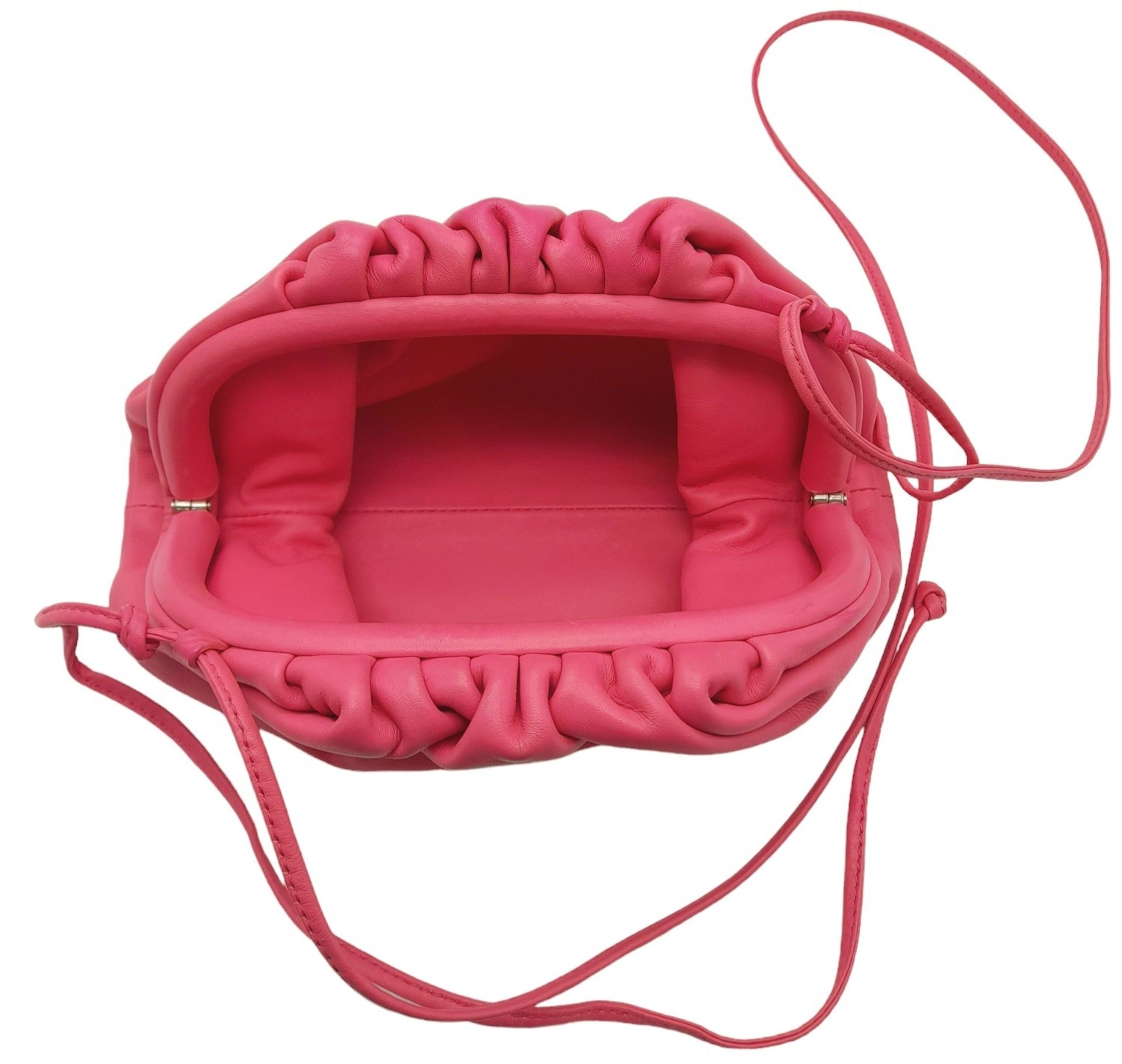 A Bottega Veneta Pink Mini Pouch Bag. Leather exterior with thin strap and magnetic closure. Pink - Image 4 of 9