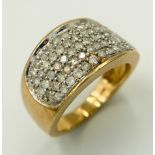 A 9K YELLOW GOLD DIAMOND CLUSTER RING. 0.75CT. 5.8G. SIZE N
