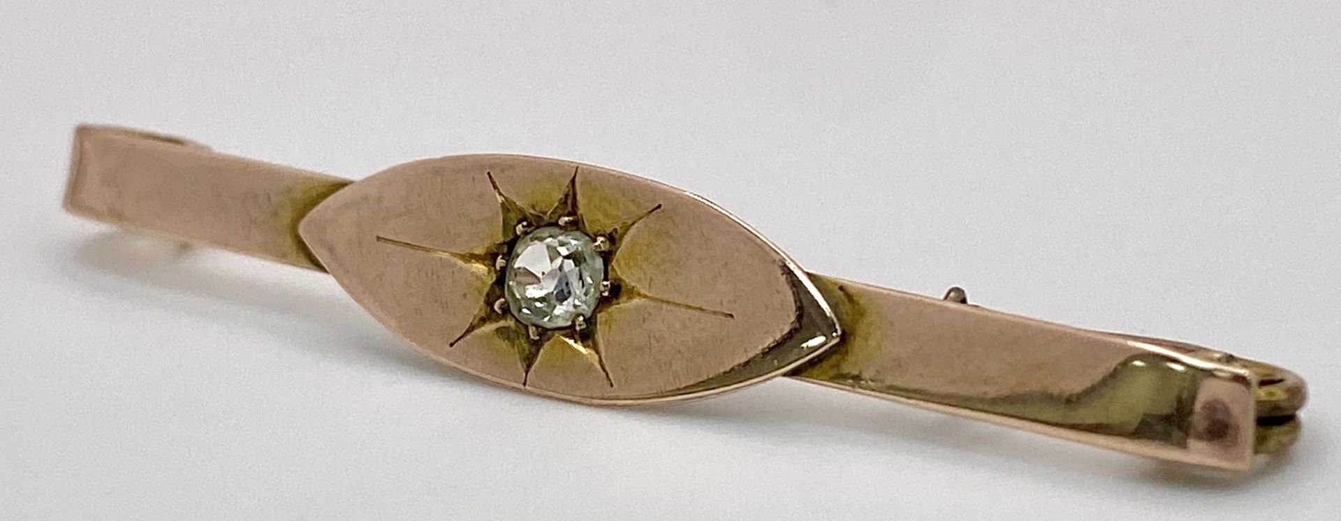 An Antique 9K Rose Gold (tested) Diamond Bar Brooch. A Gypsy set quality old cut diamond. 5.5cm. 4. - Image 3 of 5