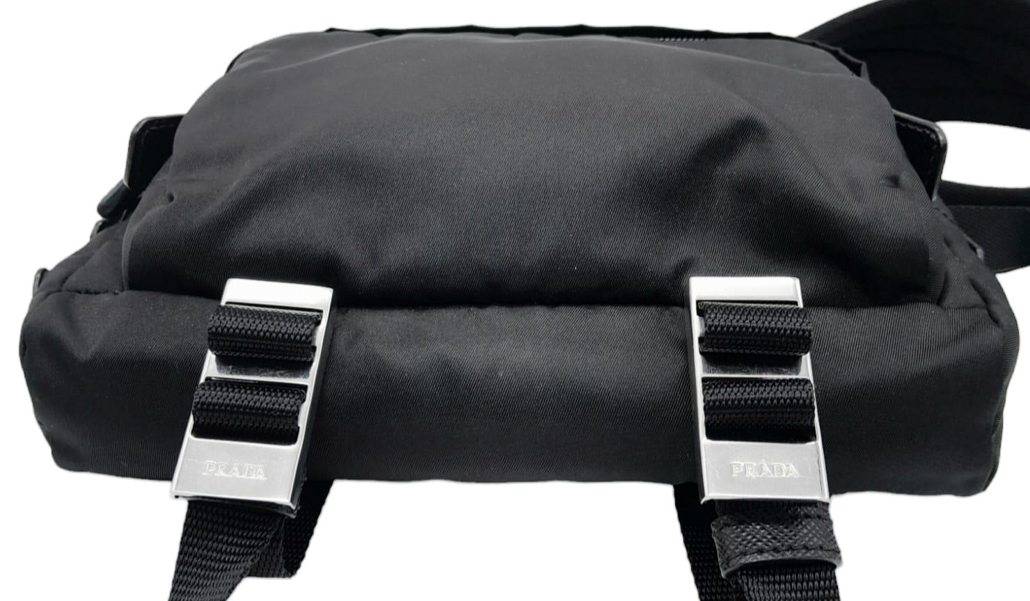 A Prada Black 'Tessuto Montagna' Crossbody Bag. Textile exterior with silver-toned hardware, a - Image 6 of 11