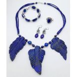 A Lapis Lazuli jewellery Suite Comprising of: Decorative leaf necklace, bracelet, drop earrings