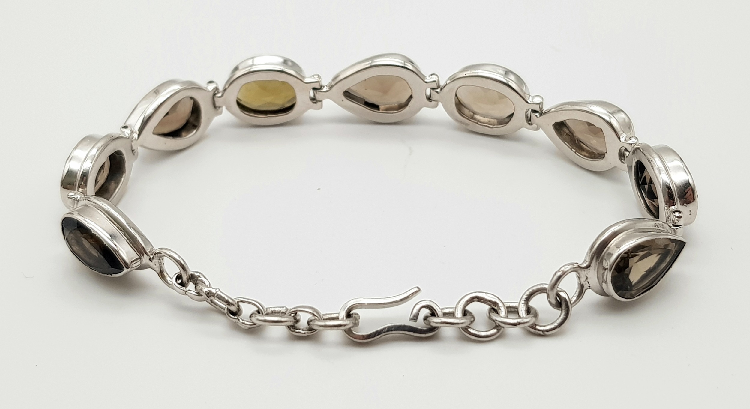 A Silver Smoky Quartz Tennis Bracelet. Set in 925 Sterling silver. 39ctw. W- 19.4g. Ref: HV2242 - Image 3 of 5