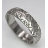 A Vintage Platinum Band Ring with Geometric Decorative Pattern. 5mm width. Size P. 7.5g