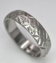 A Vintage Platinum Band Ring with Geometric Decorative Pattern. 5mm width. Size P. 7.5g