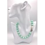 A Large Beaded Amazonite Necklace with a Keisha Baroque Pearl Interrupter. 14mm beads. Necklace