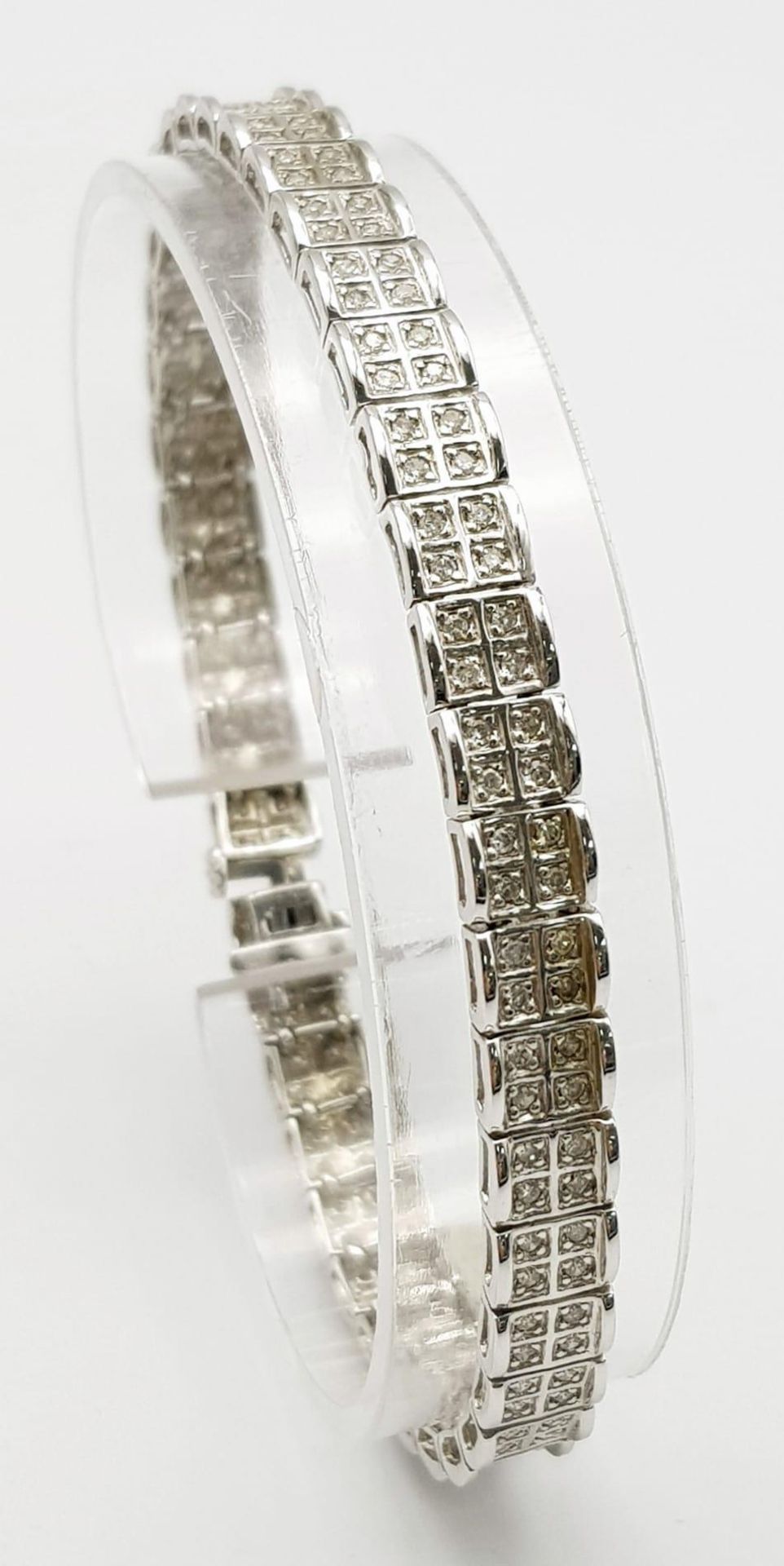 A 9K White Gold Diamond Set Bracelet, with Under Safety Catch Fitting. 1ctw, 19cm length, 12.7g - Image 2 of 15