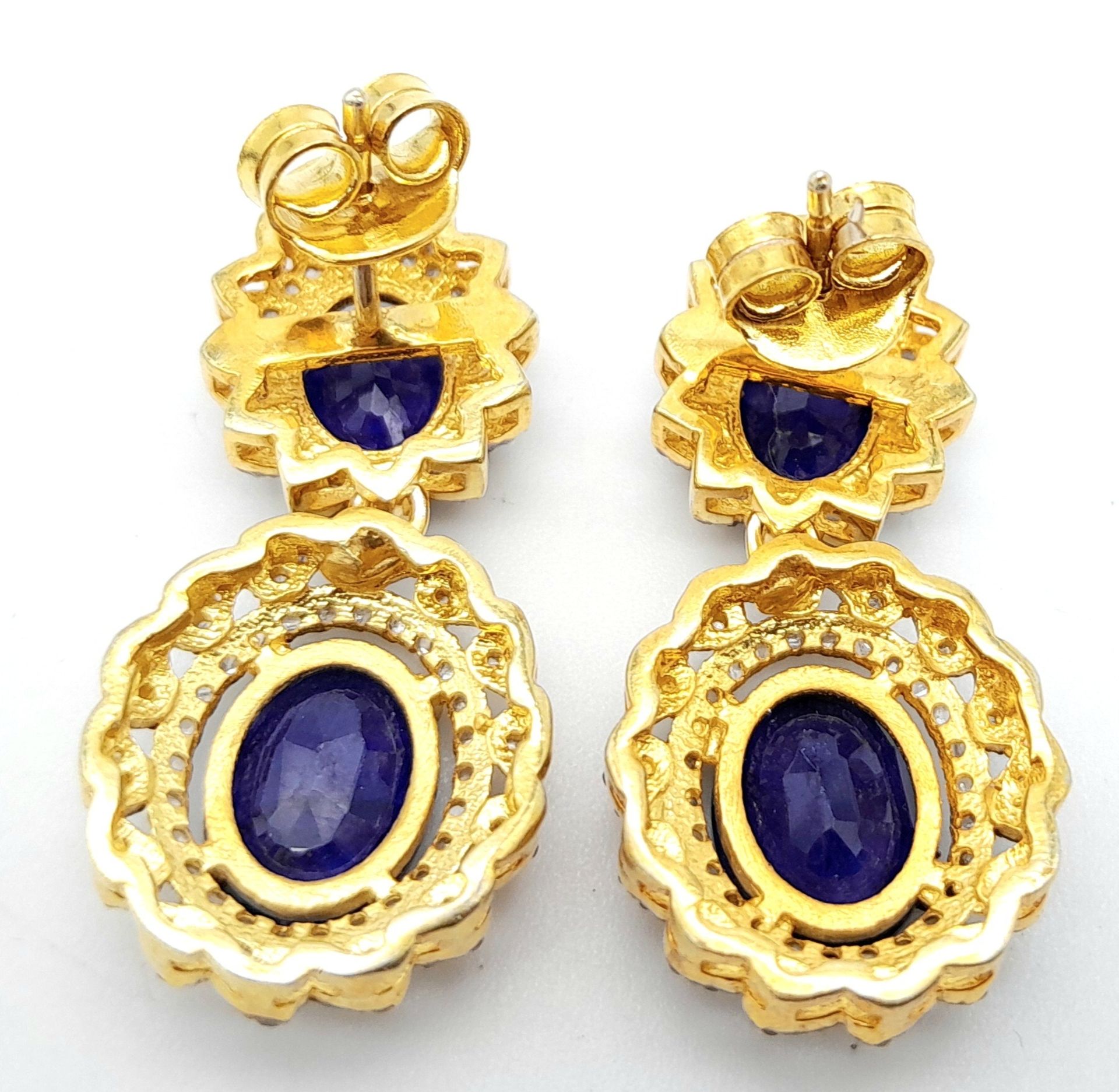 A Pair of Blue Sapphire Gemstone Drop Earrings with Diamond Surrounds. Set in gilded 925 Silver. - Image 2 of 3
