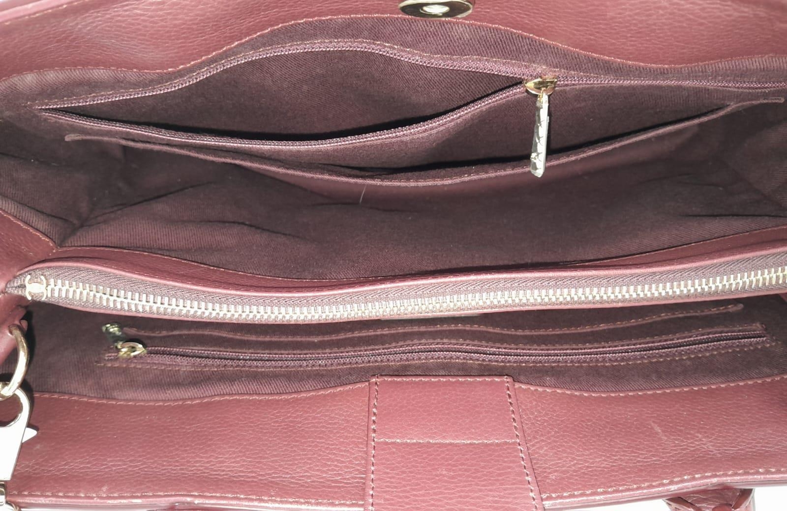 A Chanel Neo Executive Leather Tote Bag. Burgundy leather exterior with gold tone hardware and two - Image 5 of 11