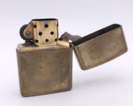A Vintage Brass Zippo Lighter. USA Made. Marked X. Comes with a Vintage Zippo Lighter Collection