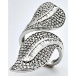 An incredibly attractive sterling silver and 14 K white gold-plated ring with a naturalistic