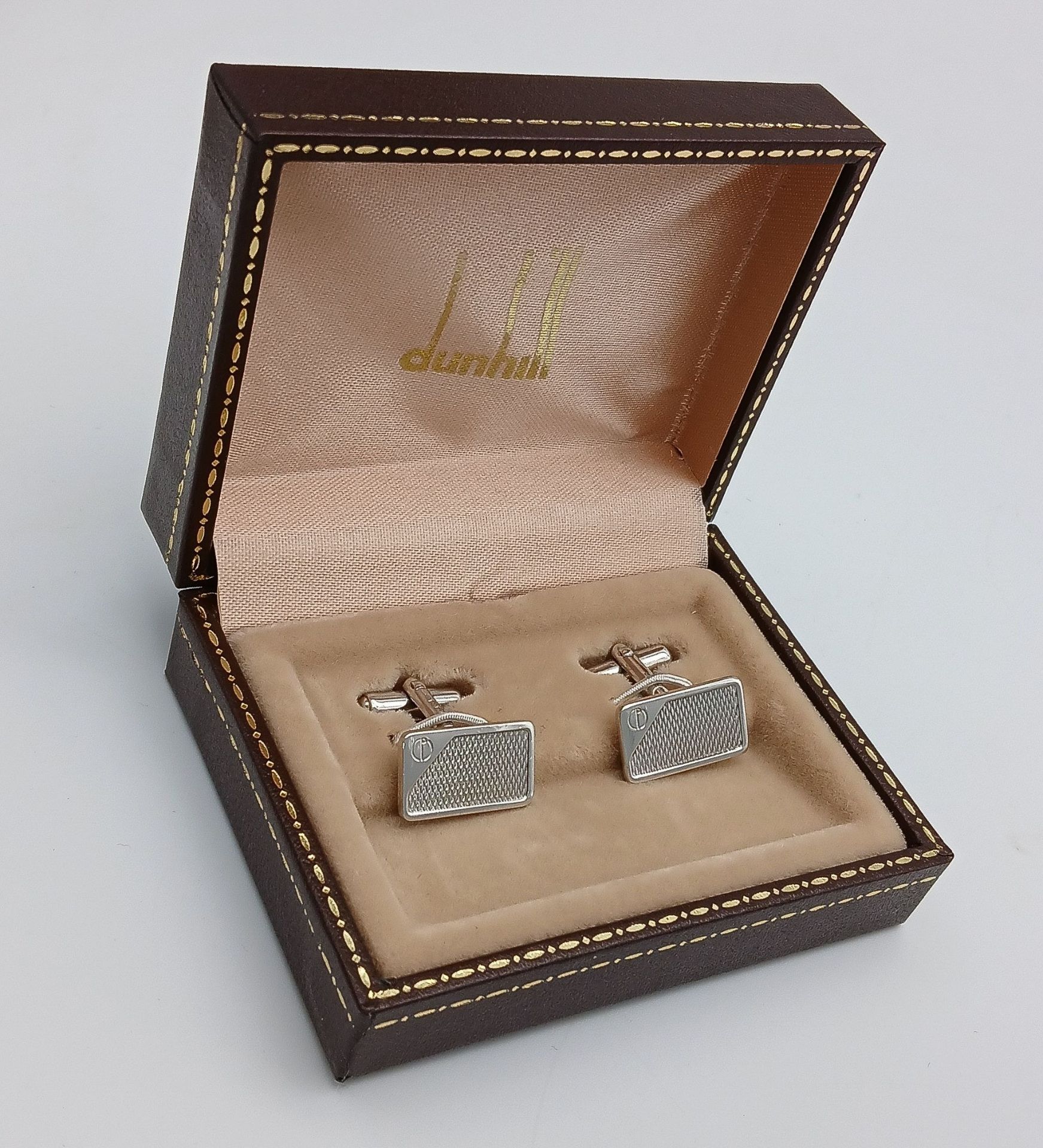 An Excellent Condition Pair of 1985 Hallmarked Sterling Silver Engine Turned Cufflinks by Dunhill. - Image 3 of 7