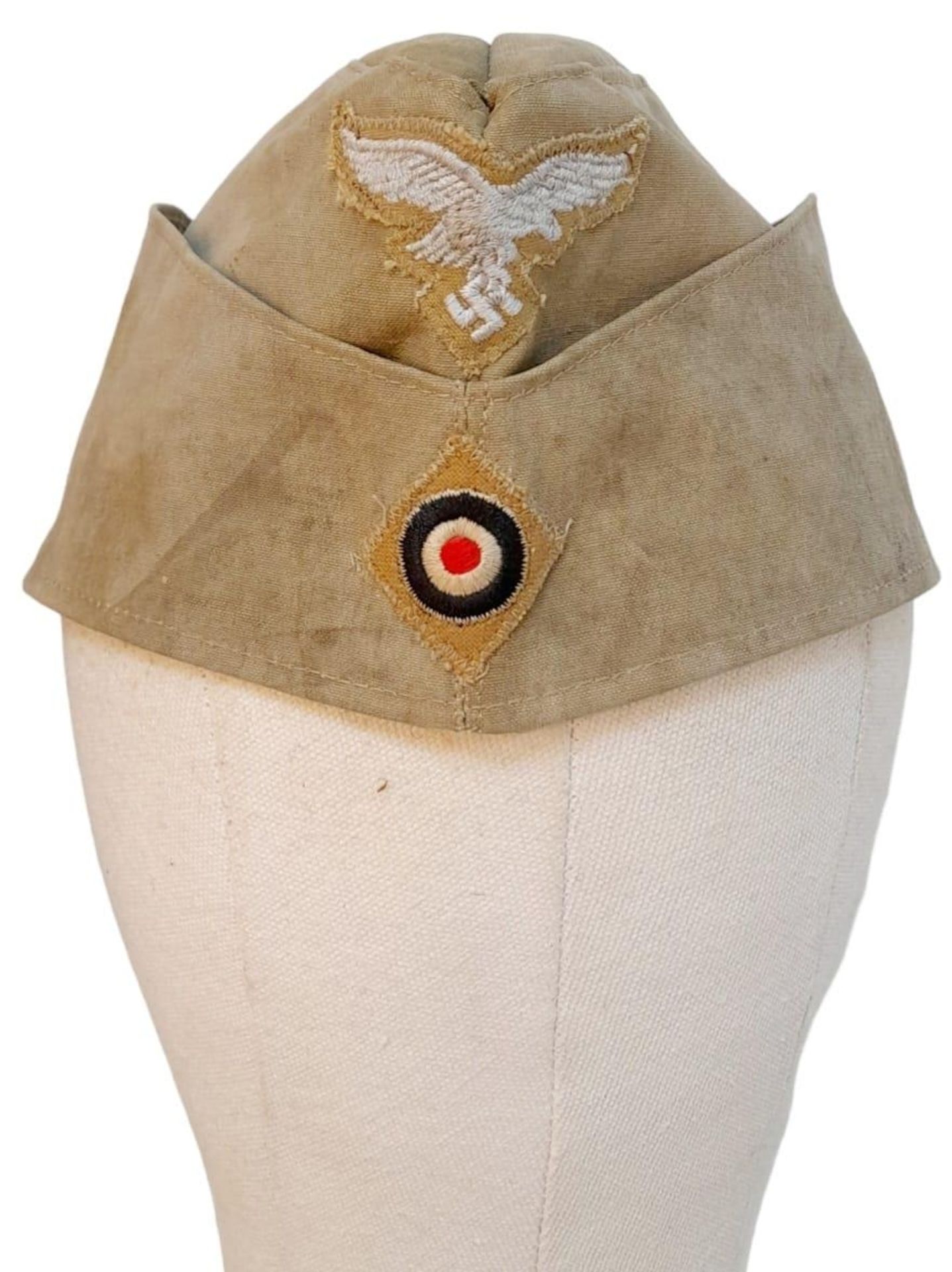 A WW2 German Africa Corps Side Cap. Faint markings on inner.