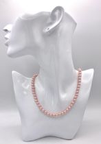 A Pink Cultured Pearl Beaded Necklace with 14K Gold Clasp. 40cm.