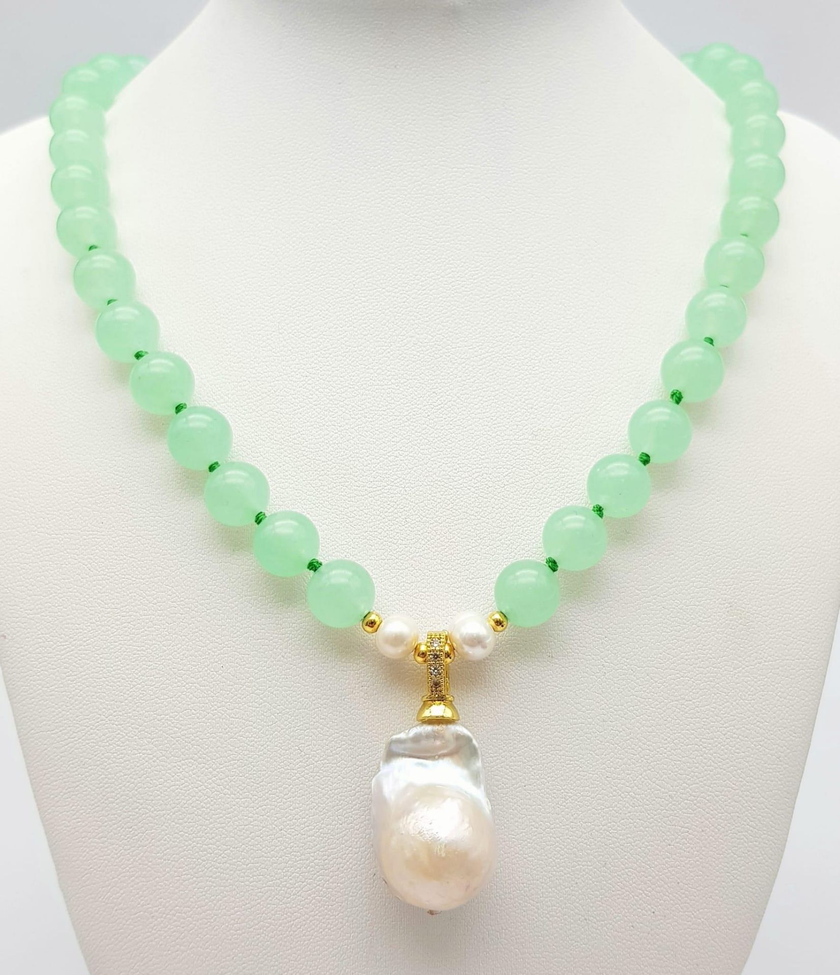 A Pale Green Jade Bead Necklace with Keisha Pearl Drop Pendant. 10mm jade beads with cultured