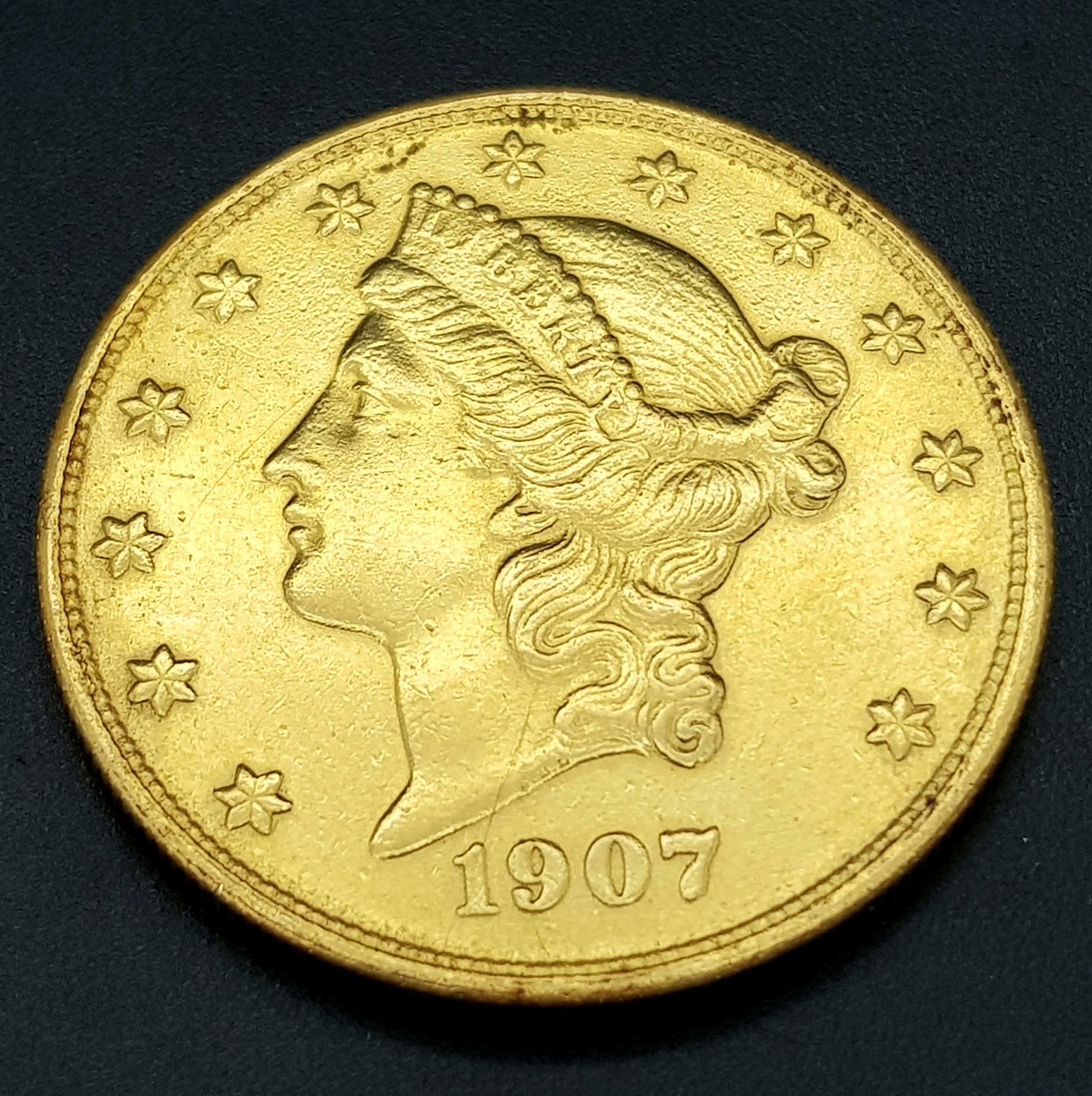 A $20 GOLD LIBERTY COIN DATED 1907 AND WEIGHING 33.43gms THIS COIN IS IN VERY GOOD CONDITION - Image 8 of 8