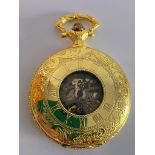 Gilded SKELETON POCKET WATCH with Gilded chain.Manual winding in full working order. Condition New