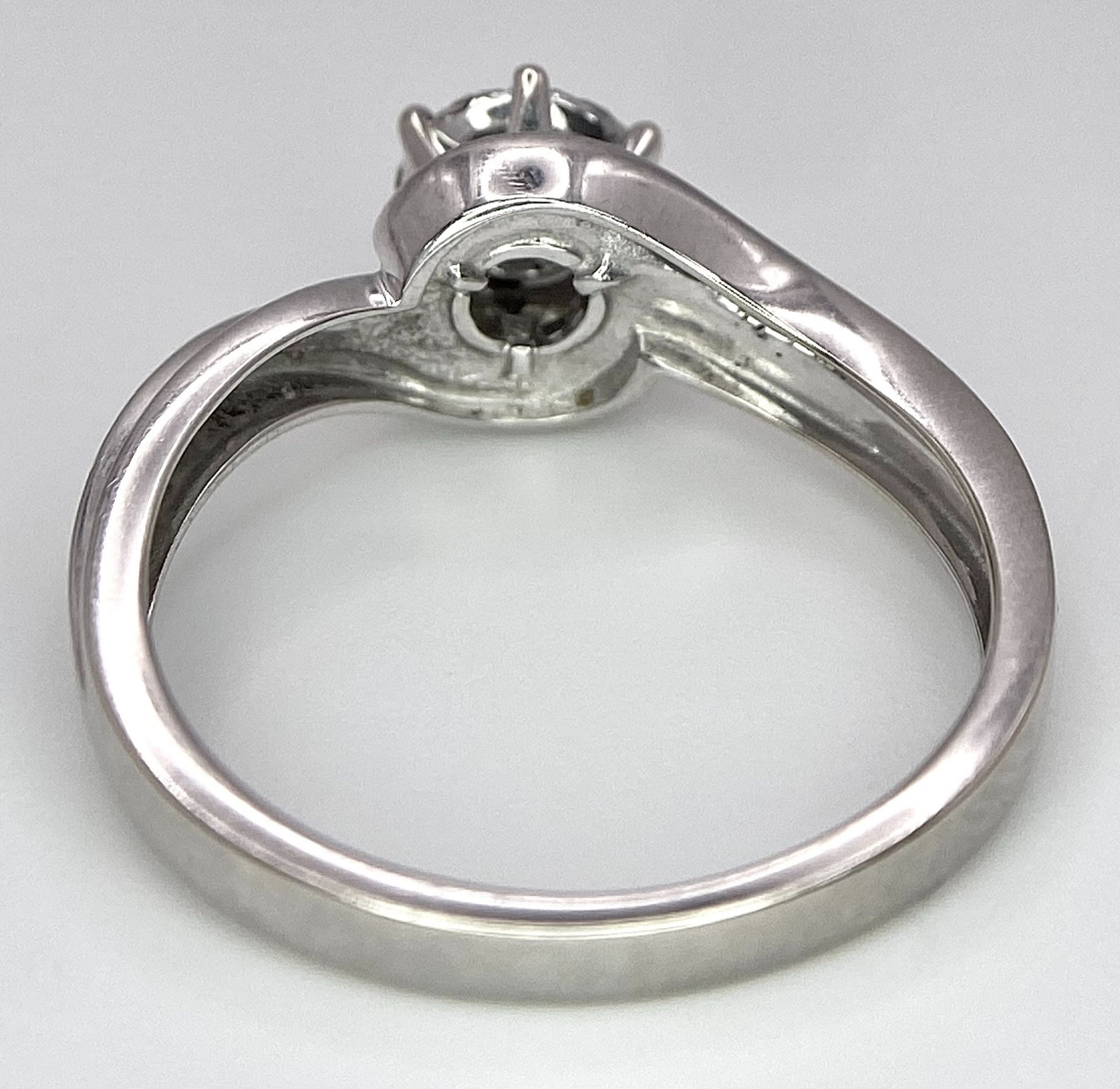 A 9K WHITE GOLD DIAMOND RING. 0.25ctw, Size L, 2.3g total weight. Ref: 8034 - Image 4 of 6
