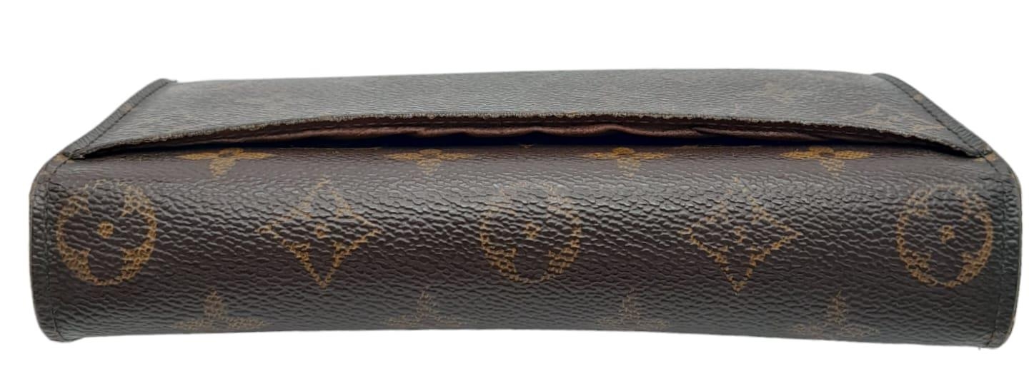 A Louis Vuitton Monogram Wallet. Leather exterior with an open compartment on back and press stud - Image 4 of 10