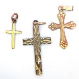 Three Different Size 9K Yellow Gold Cross Pendants. 30mm x 1.5mm largest pendant. 2.22g total