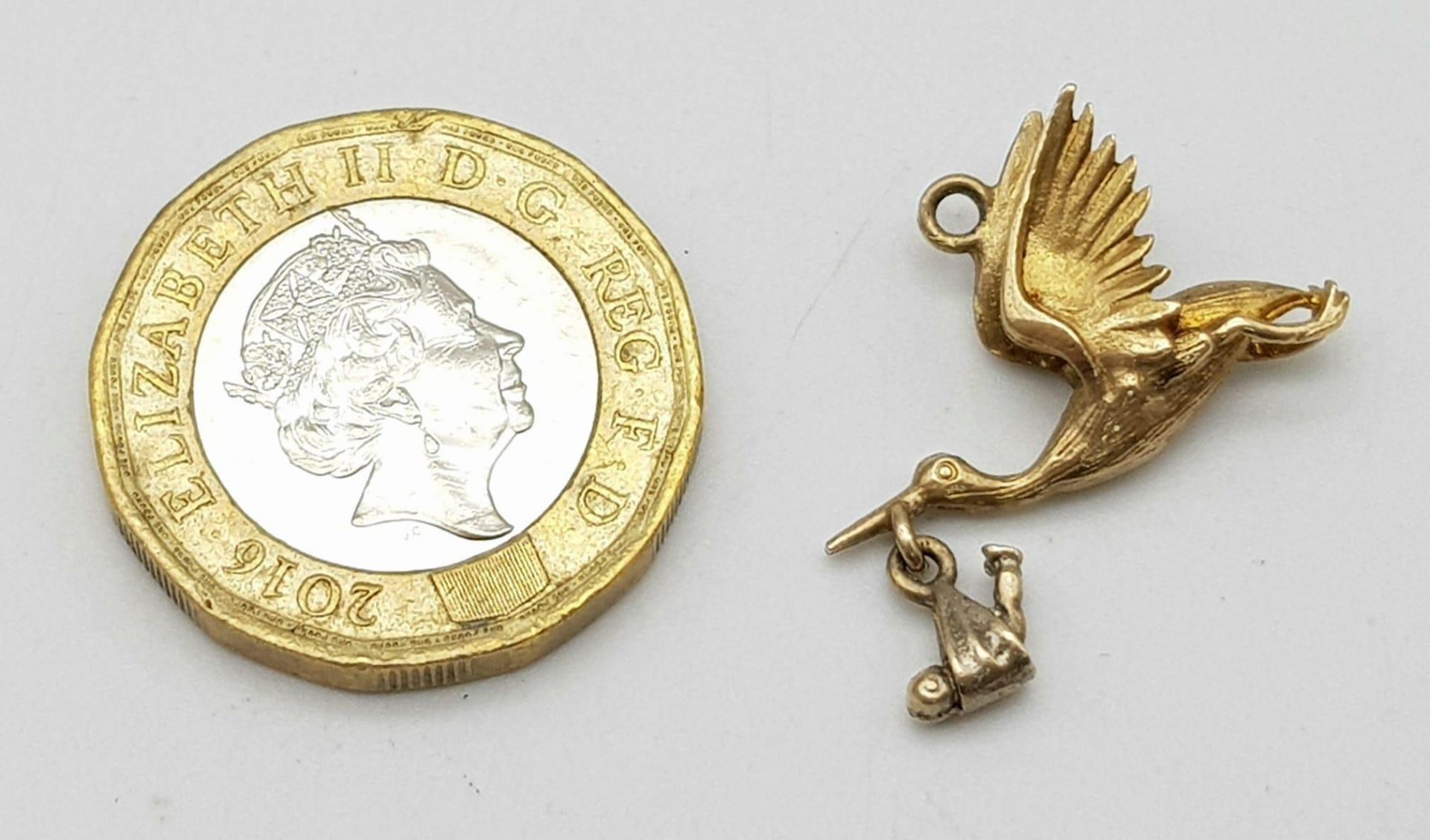 A 9K Yellow Gold Stork and Baby Pendant/Charm. 25mm. 2.35g weight. - Image 4 of 4