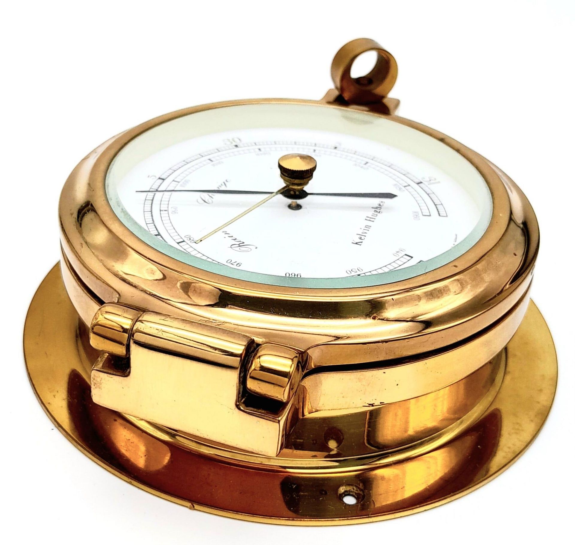 A Nautical, polished brass, KELVIN HUGHES barometer, having the shape of a ship-cabin’s porthole, - Image 5 of 7