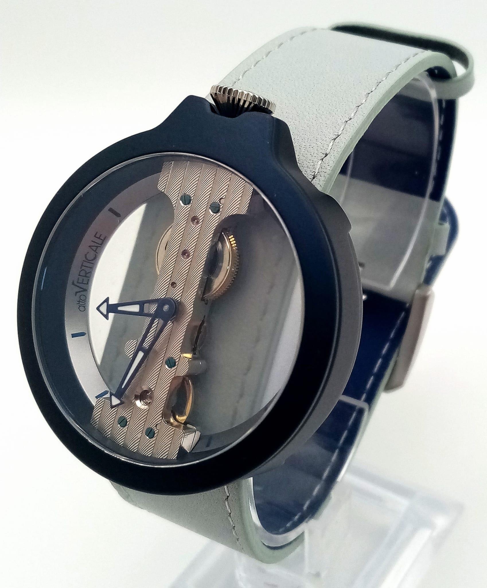 A Verticale Mechanical Top Winder Unisex Watch. Turquoise strap with navy toned skeleton case. As - Image 2 of 6