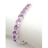 An Amethyst Gemstone Tennis Bracelet set in 925 Silver. 18cm. Ref: CD-1282