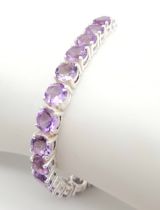 An Amethyst Gemstone Tennis Bracelet set in 925 Silver. 18cm. Ref: CD-1282