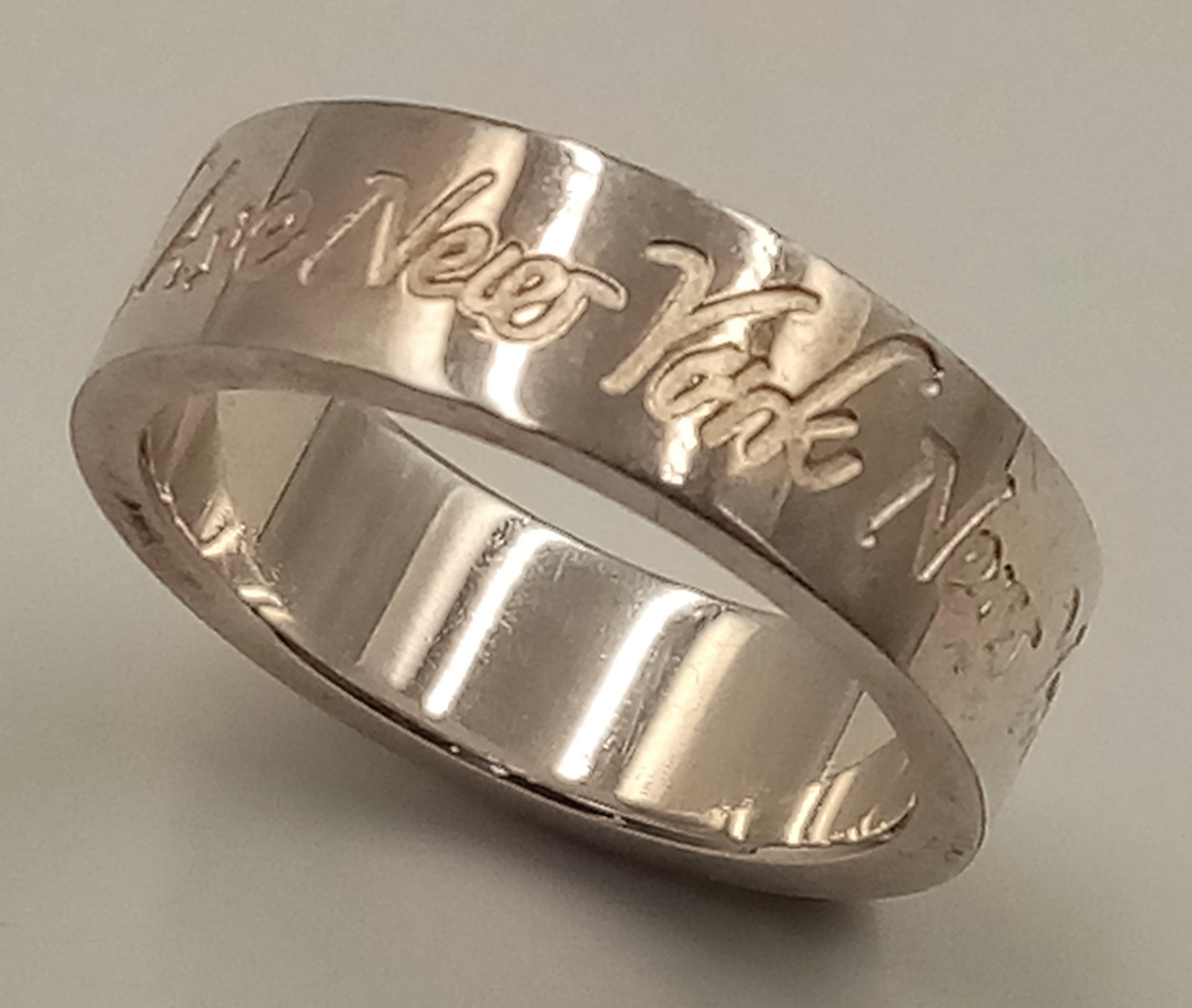 A TIFFANY & CO STERLING SILVER BAND RING, 727 NEW YORK FIFTH AVENUE. Size N, 5g total weight. Ref: - Image 5 of 5