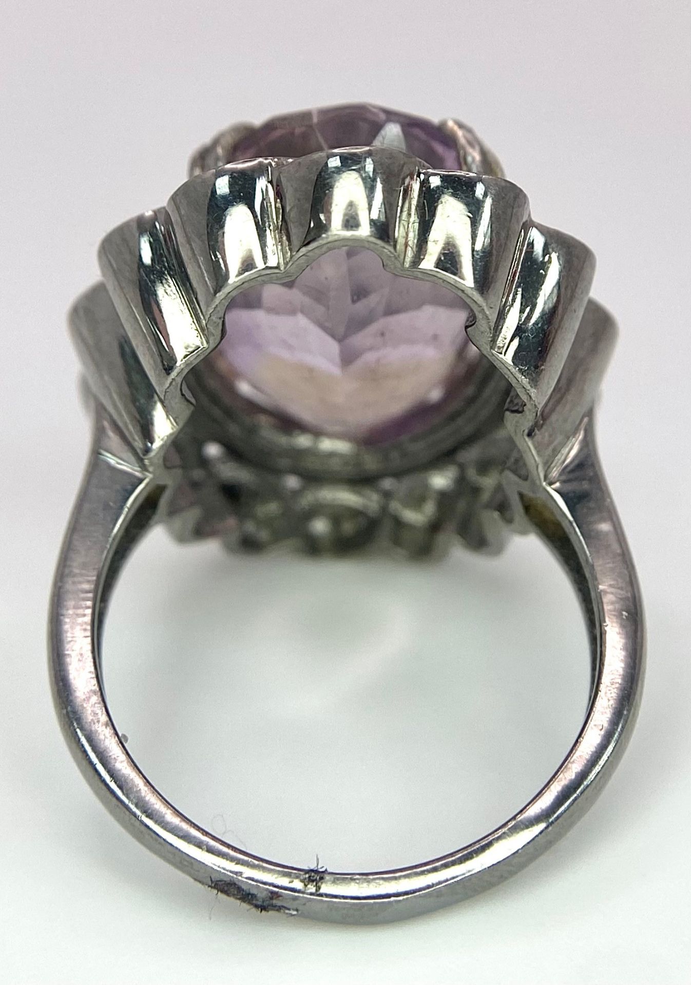 An 11.65ct Amethyst Ring with 0.25ctw of Diamond Accents. Set in 925 Silver. Size N. 9.4g total - Image 3 of 6