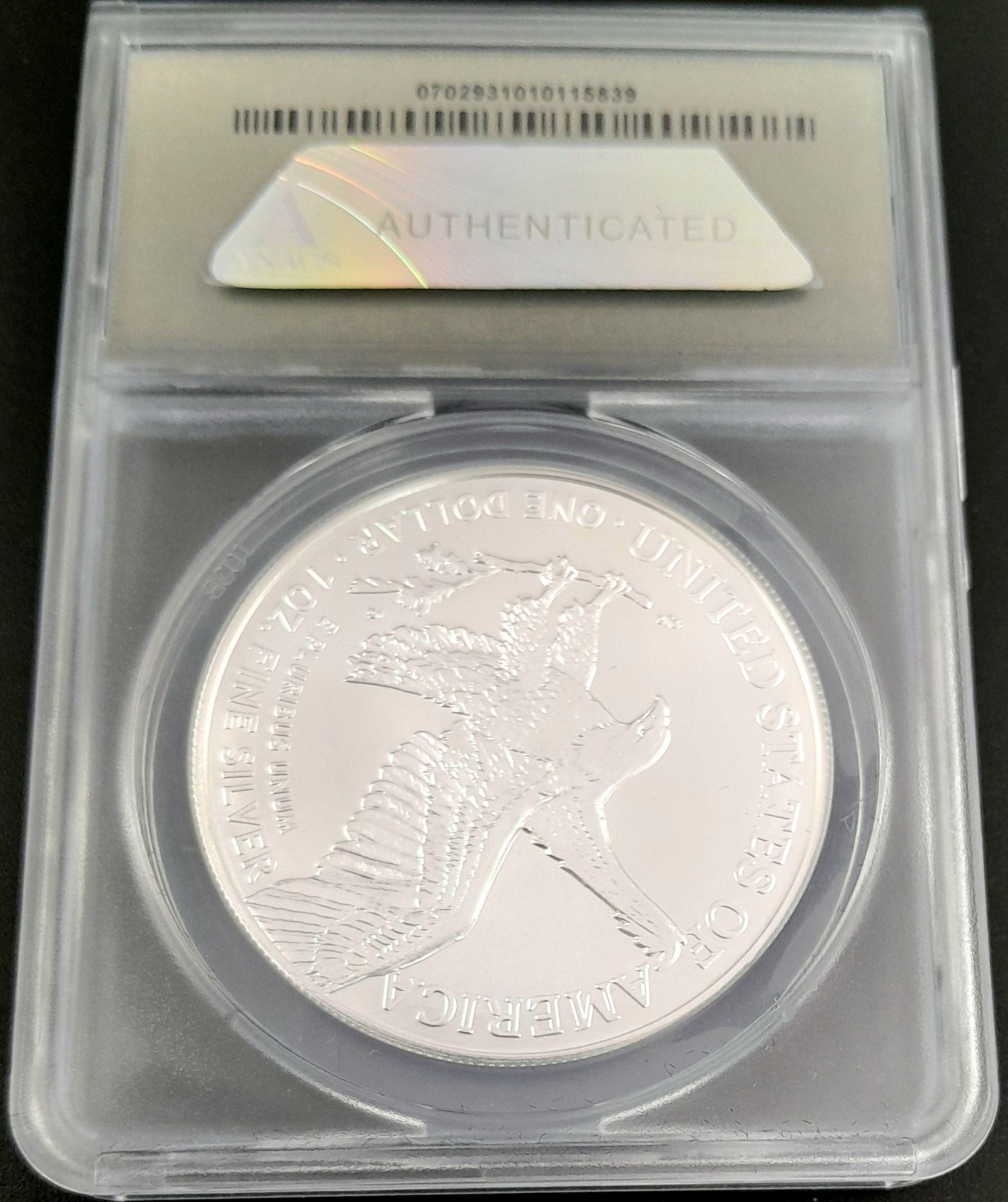 A Presentation Cased, Slabbed, ‘Inaugural Strike’ 2022 Silver Eagle Coin - Grade MS70 (no. 71 of 495 - Image 2 of 4