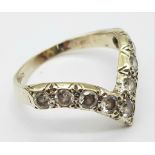A fancy sterling silver CZ wishbone ring. Total weight 2.8G. Size L/M.
