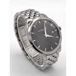 A Classic Raymond Weil Geneve Quartz Gents Watch. Stainless steel bracelet and case - 39mm. Silver