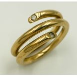 A 9K YELLOW GOLD, SERPENT STYLE DIAMOND BAND RING. 10G. SIZE T.