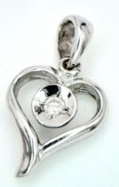 A 18ct White Gold Diamond Heart Pendant, 0.02ct diamond, 0.7g weight, approx 14mm x 8mm. ref:
