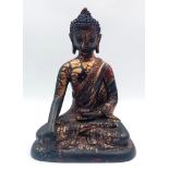 A Majestic Antique Chinese Seated Buddha Figure - Decorated with gilt and polychrome highlights.