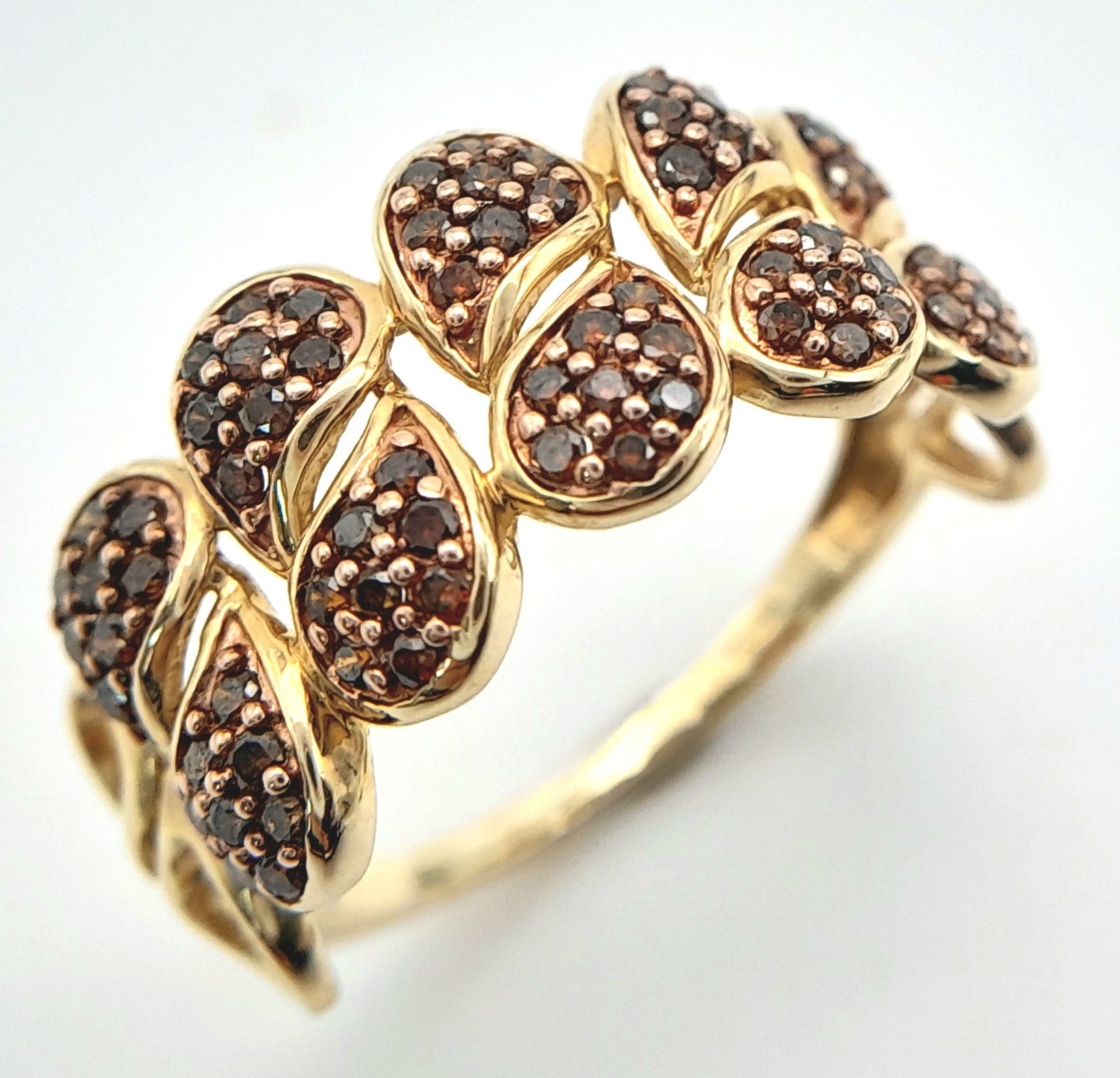 A 9K YELLOW GOLD COLOURED DIAMOND SET RING. 0.80ctw, Size N, 2.2g total weight. Ref: SC 8036