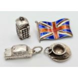 A STERLING SILVER LONDON THEMED COLLECTION OF ITEMS - UNION JACK FLAG BROOCH, CUP OF TEA CHARM,