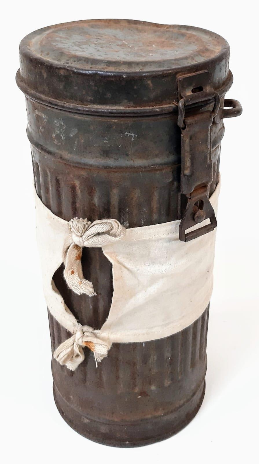 WW2 German Medics Gas Mask Canister. Genuine Period Medics Armband tied around the tin. Traces of - Image 2 of 5