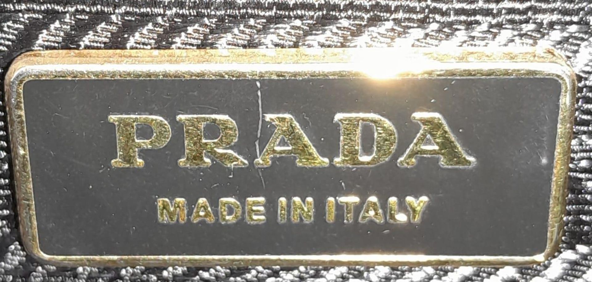 A Prada Black Bauletto Handbag. Saffiano leather exterior with gold-toned hardware, padlock, 2 - Image 9 of 11