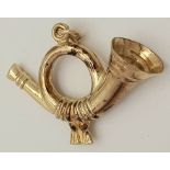 A 9K YELLOW GOLD FRENCH HORN/BUGLE CHARM. 3cm x 2.3cm, 1.3g weight. Ref: SC 8042