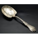 A TRULY REMARKABLE LARGE SOLID SILVER FRUIT SPOON , 22cms IN LENGTH AND 7cms WIDTH . 98.2gms