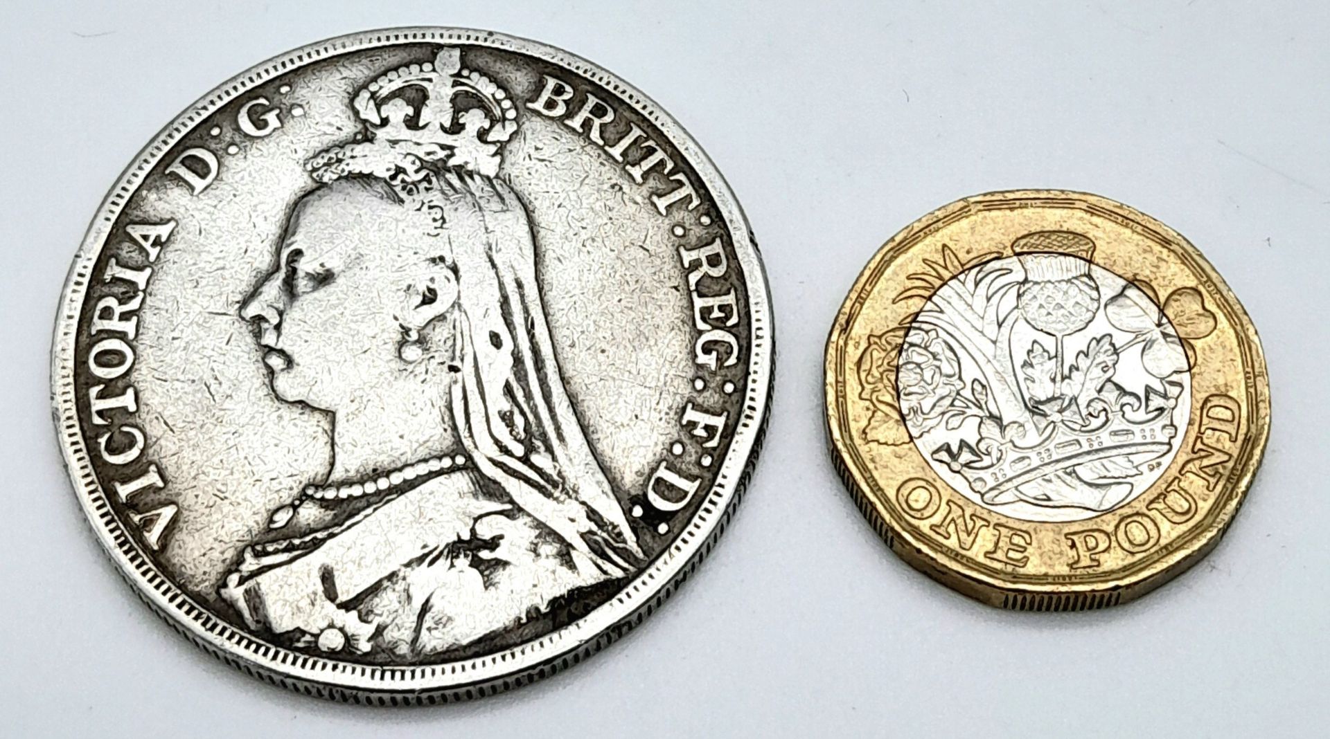 An 1890 Queen Victoria Silver Crown Coin. VF grade but please see photos. - Image 2 of 2