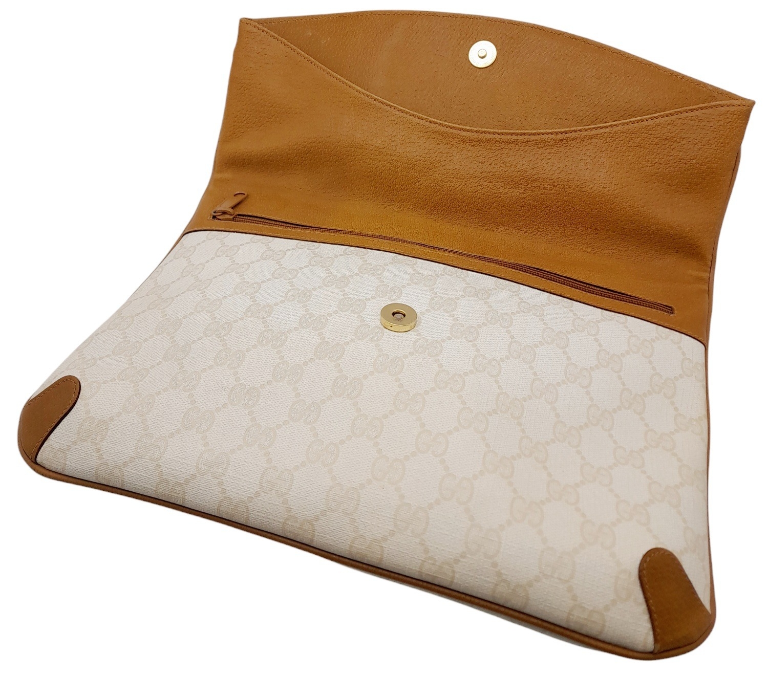 A Gucci Ivory GG Monogram Clutch Bag. Leather exterior with brown trim, gold and silver-toned GG, - Image 3 of 10