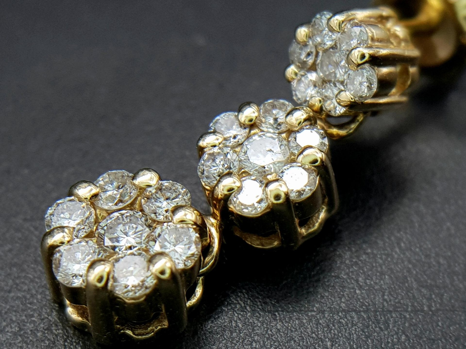 A Pair of 14K Yellow Gold and Diamond Drop Earrings. A total of 42 round cut diamonds - 1ctw. H-I in - Image 4 of 8